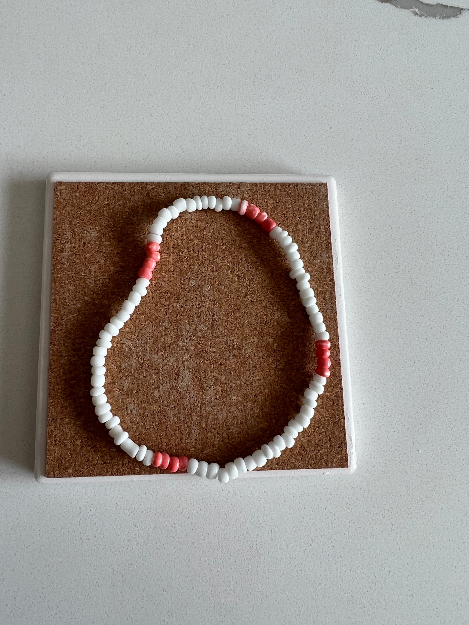 White and peach anklet