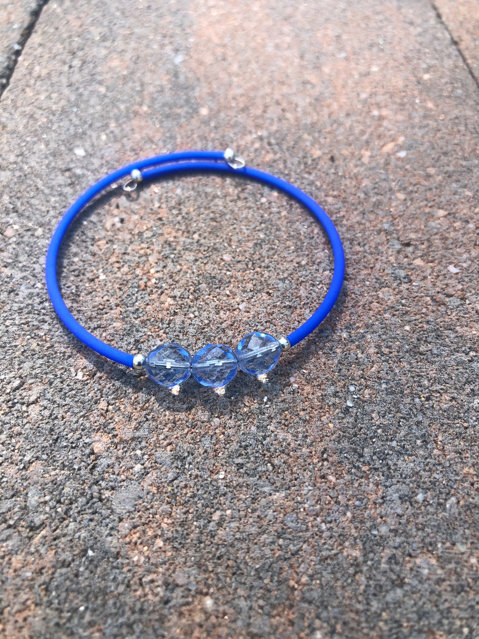 Clear blue beaded cuff bracelet