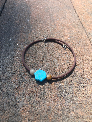 Turquoise stone and brown cuff bracelet