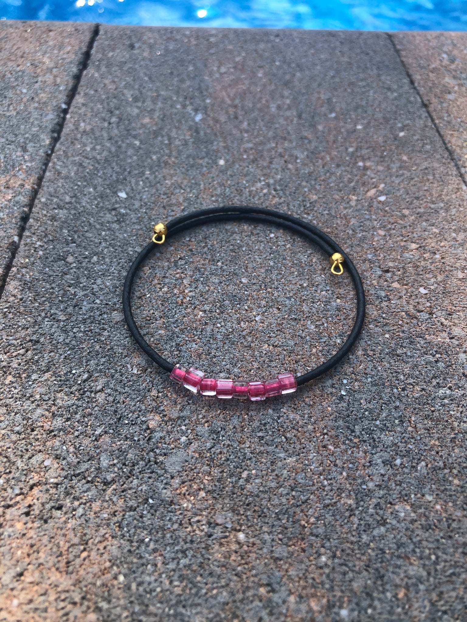 Black and magenta beads cuff bracelet